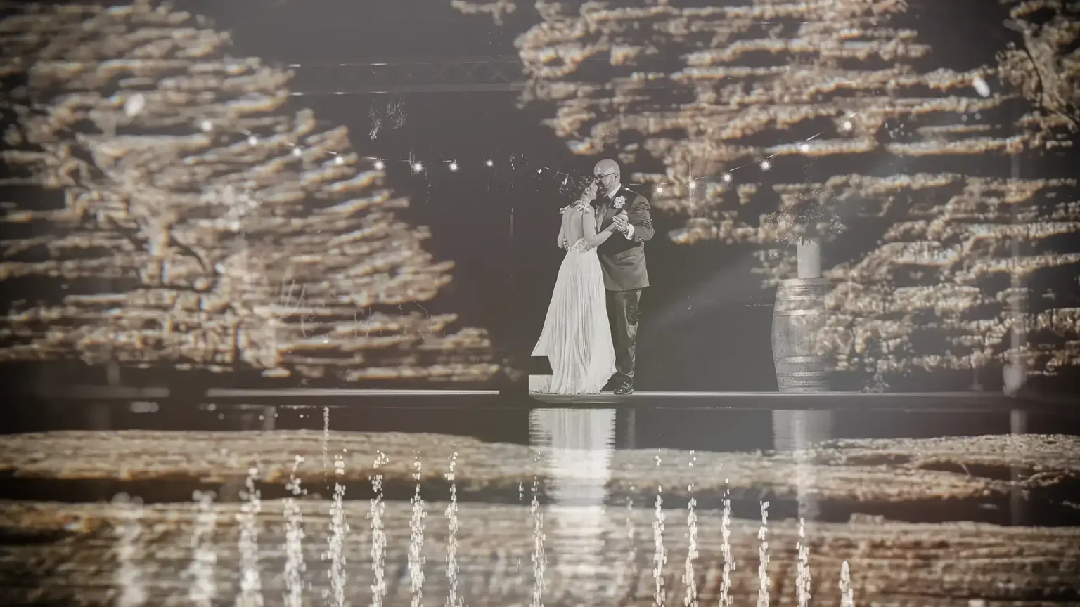 Artistic double exposure of Athina and Dimitris’s first dance, layered with reflected lights at Ktima Kokotou
