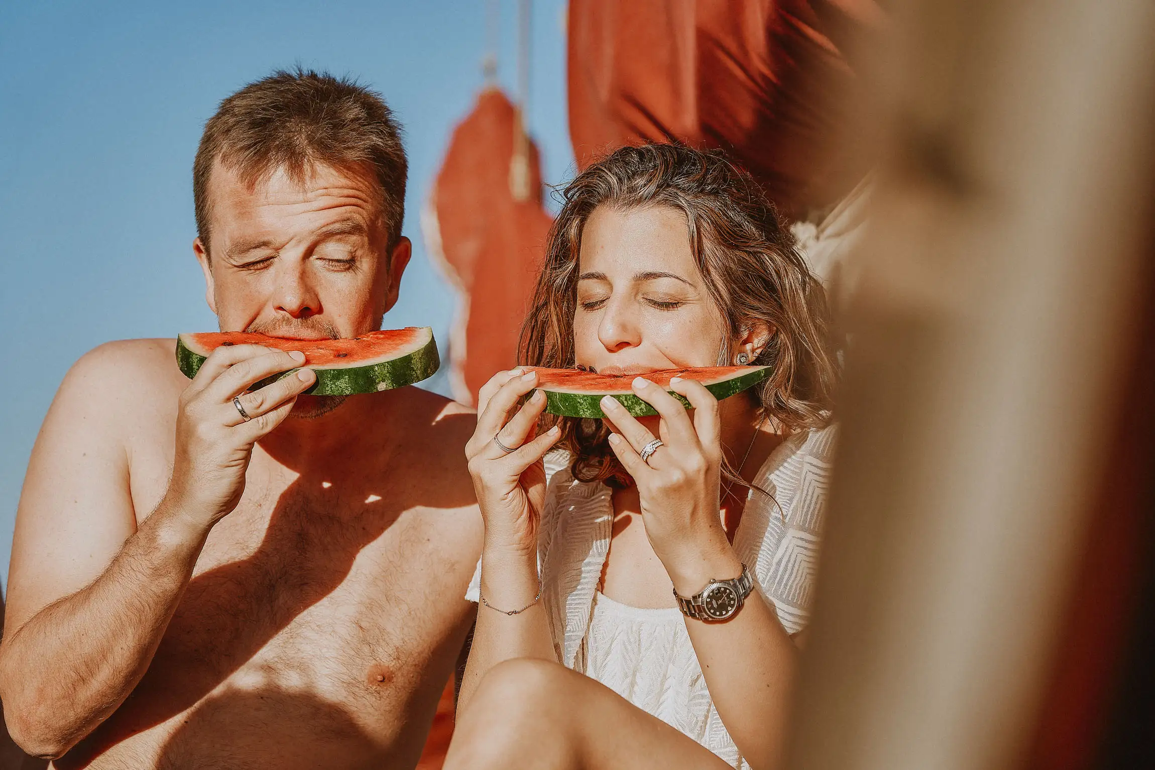 milos wedding cruise photo eating watermelon